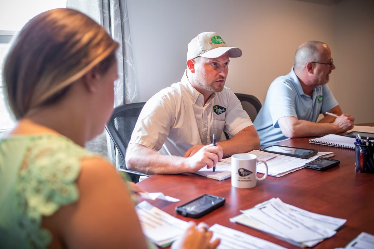 joshua tree team meets at conference table