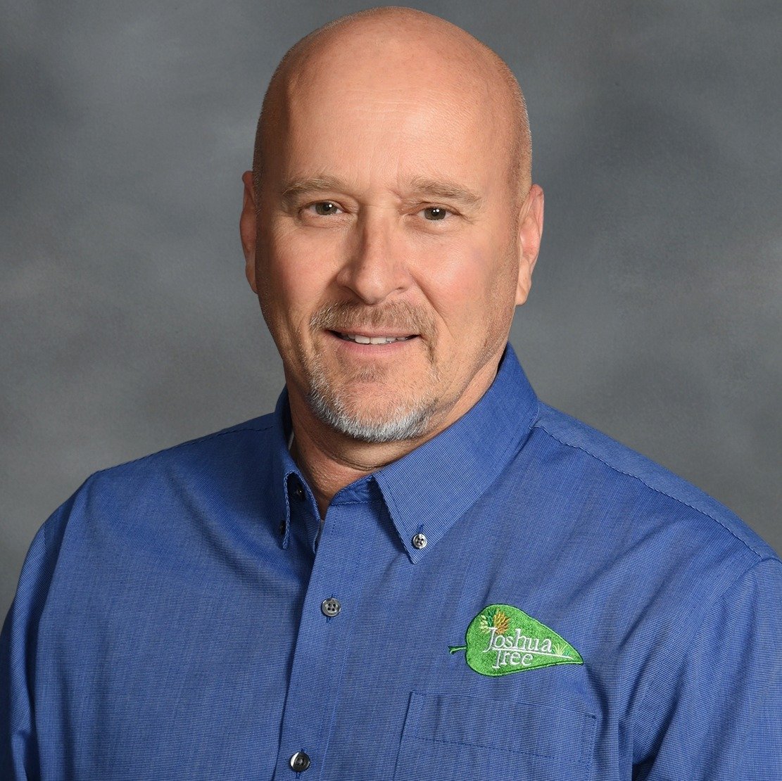 Professional headshot photo of Thomas Armstrong, VP of Franchise Operations at Joshua Tree Experts.